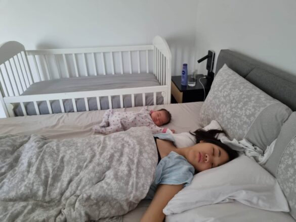 Baby and mom asleep.