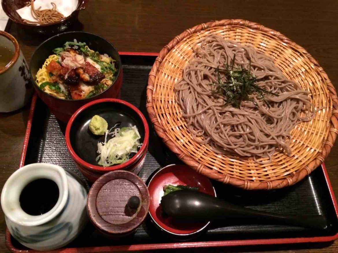 Japanese soba and mini-unadon (eel rice bowl) on a tray.